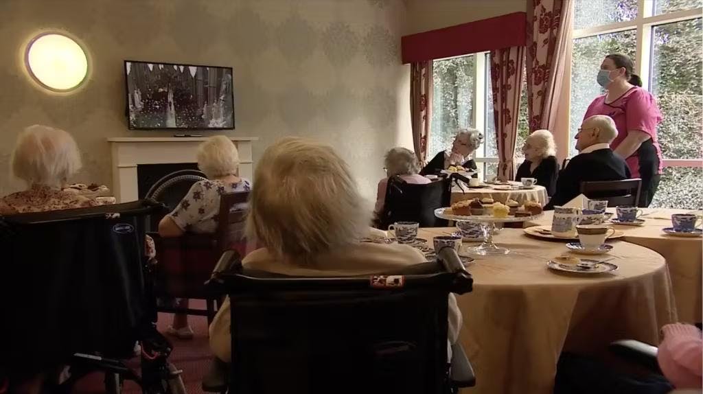 residents-watching-a-film