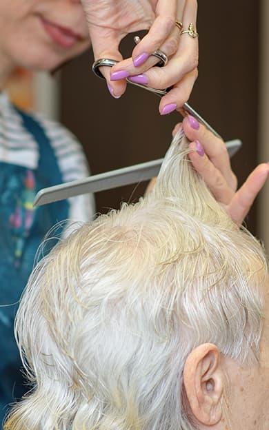 Resident Getting a Haircut