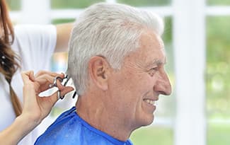 Resident Getting Hair Cut