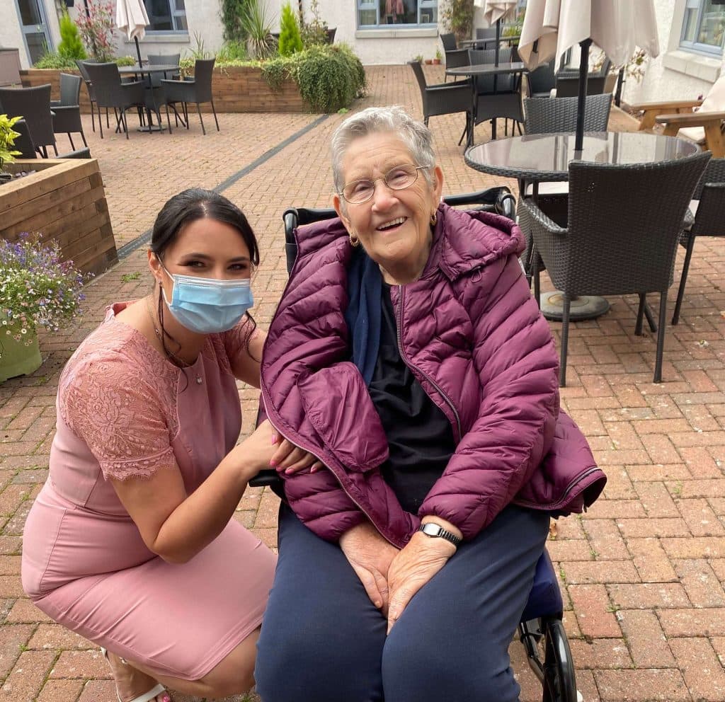 Lynn Crockett With a Resident
