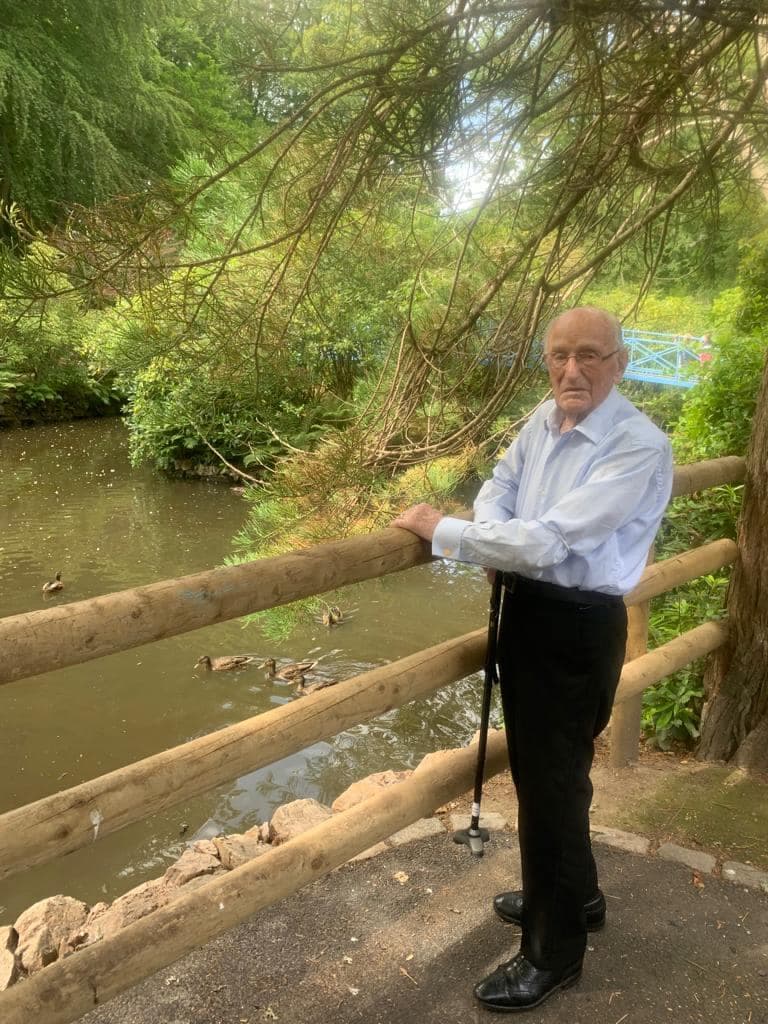 Resident Watching the Ducks When Out in the Local Community