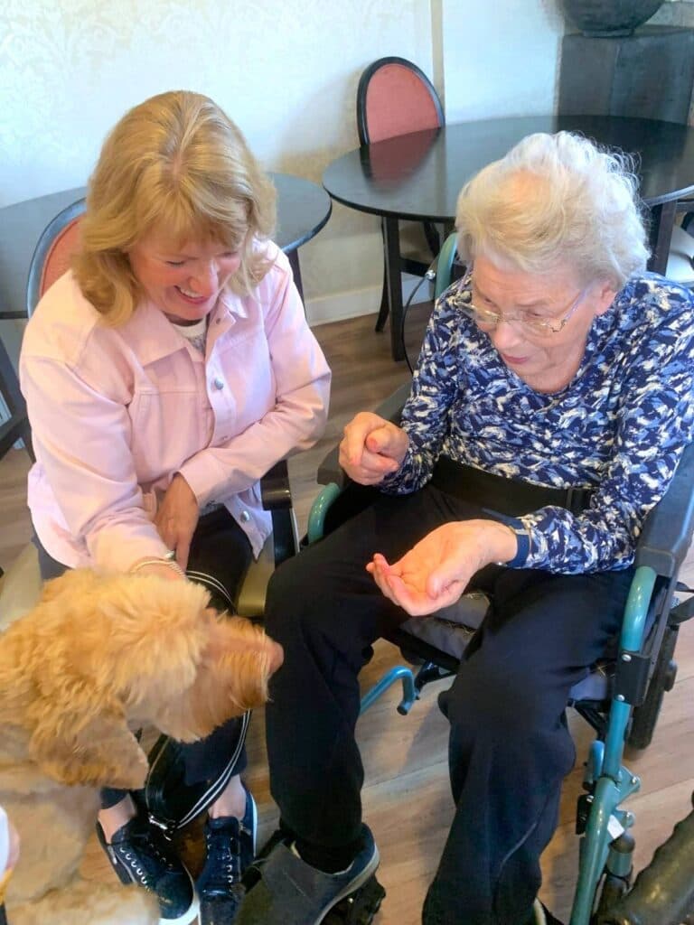 poppy the dog with residents